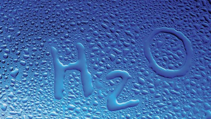 H2o Water Drops On Blue Background